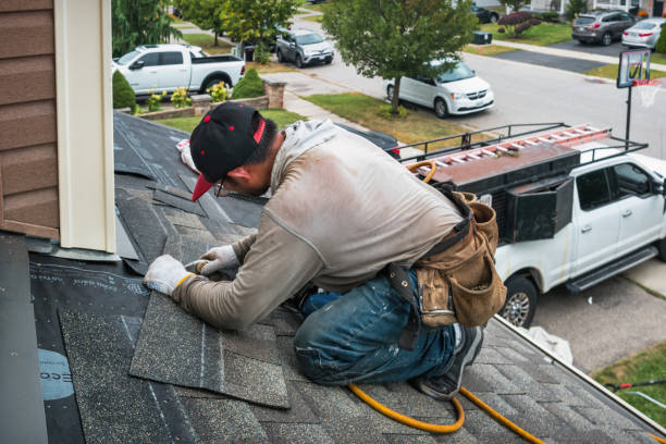 Professional Roofing technician working in Mantador, ND